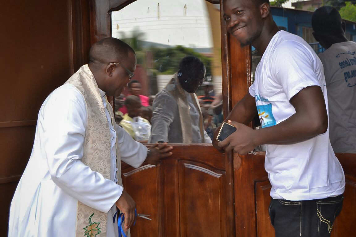 Father Bassey opening the for Hope for Lives at St. Anthony's Computer Lab