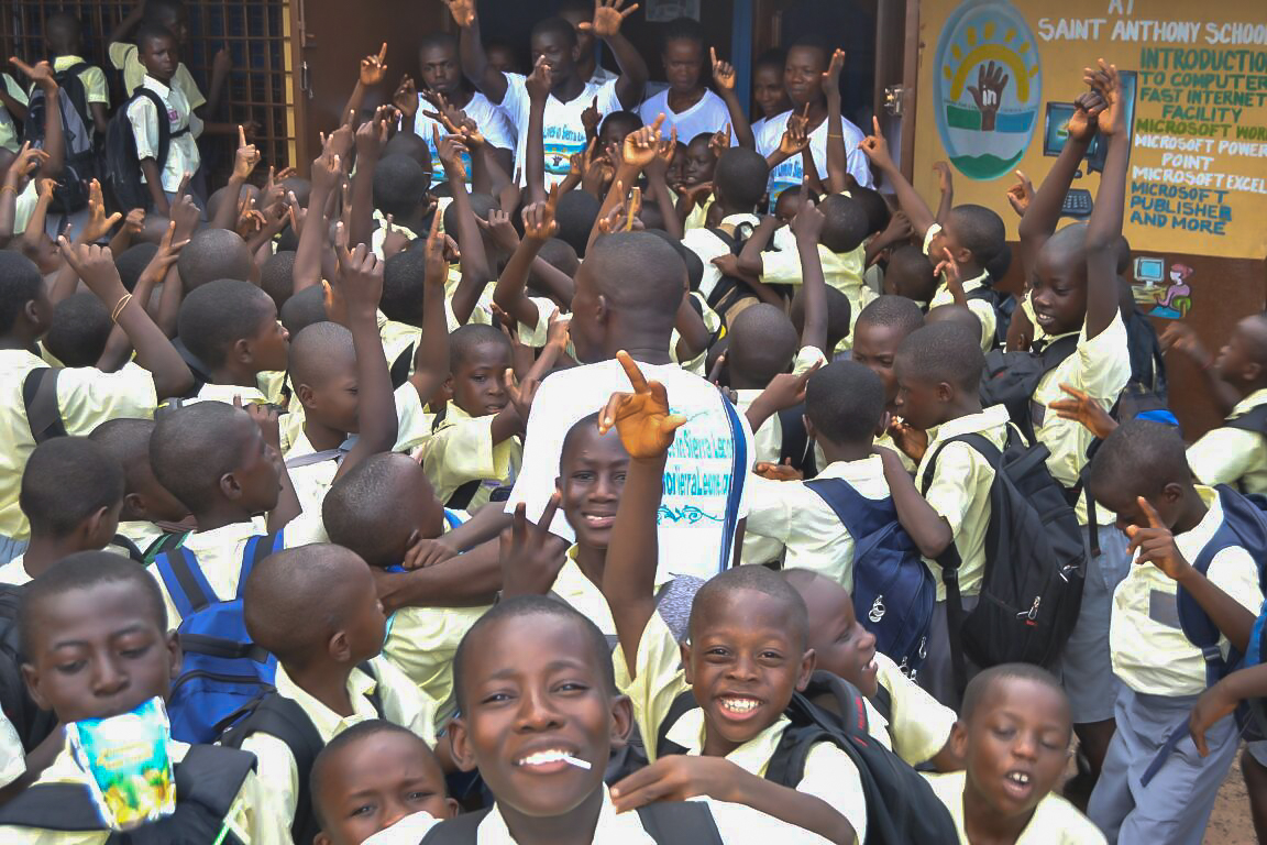 Happy school kids at opening of St. Anthony's Computer Lab