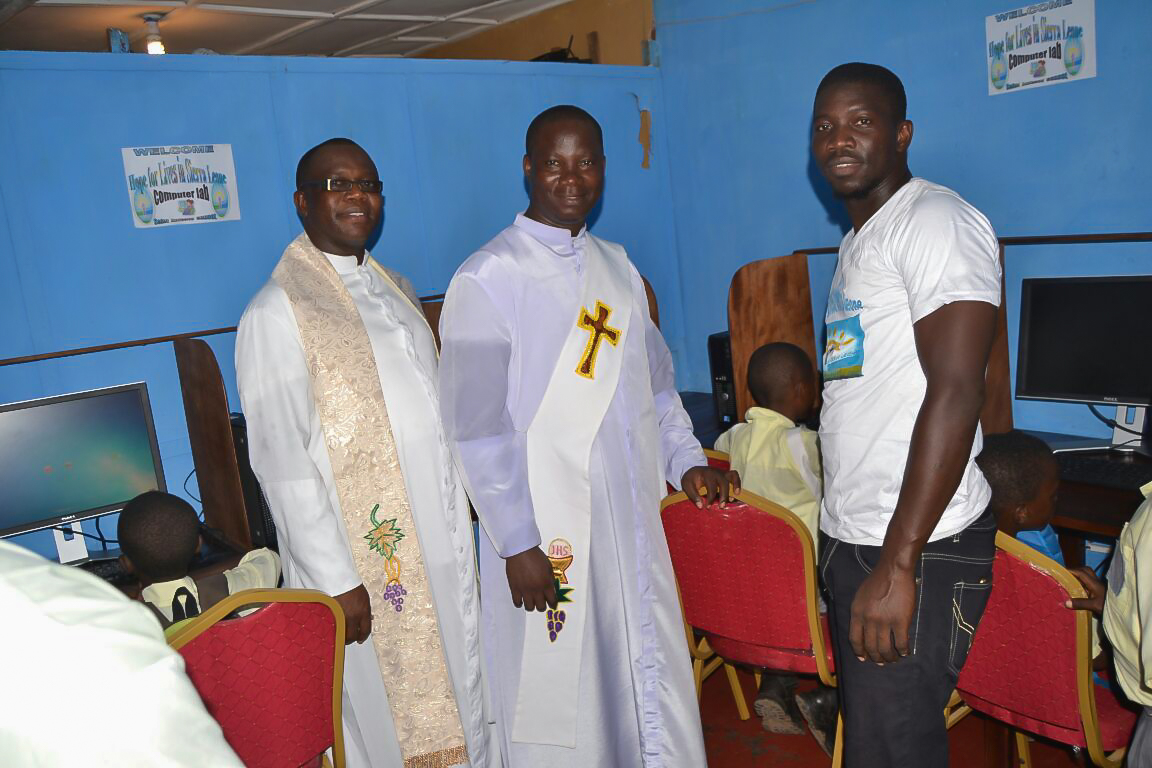 Father Bassey and Assistant with our IT guy, Kemoh Tarawally