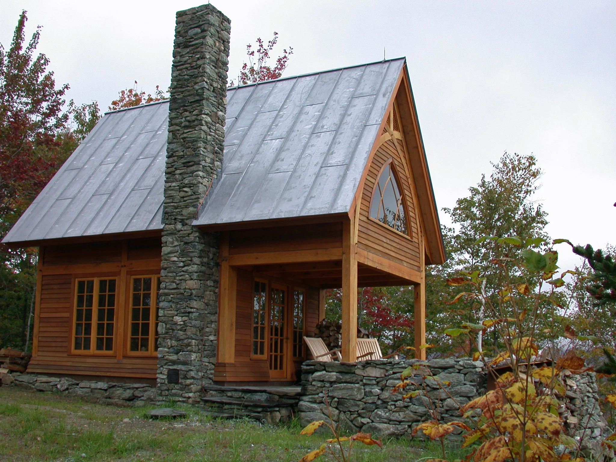 The timber frame was custom fabricated from red oak. In addition to the retreat structure, there is also a combination out house and wood shed with a solar powered composting toilet.
