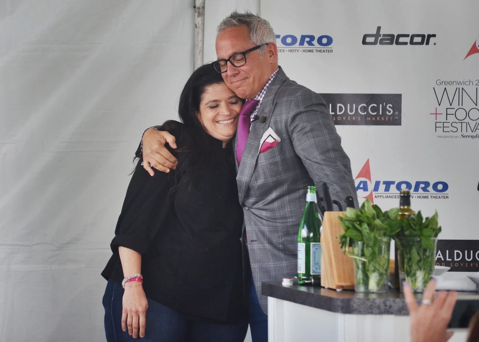Precious moment between Chef Alex Guarnaschelli and Chef Geoffrey Zakarian before his cooking demonstration.