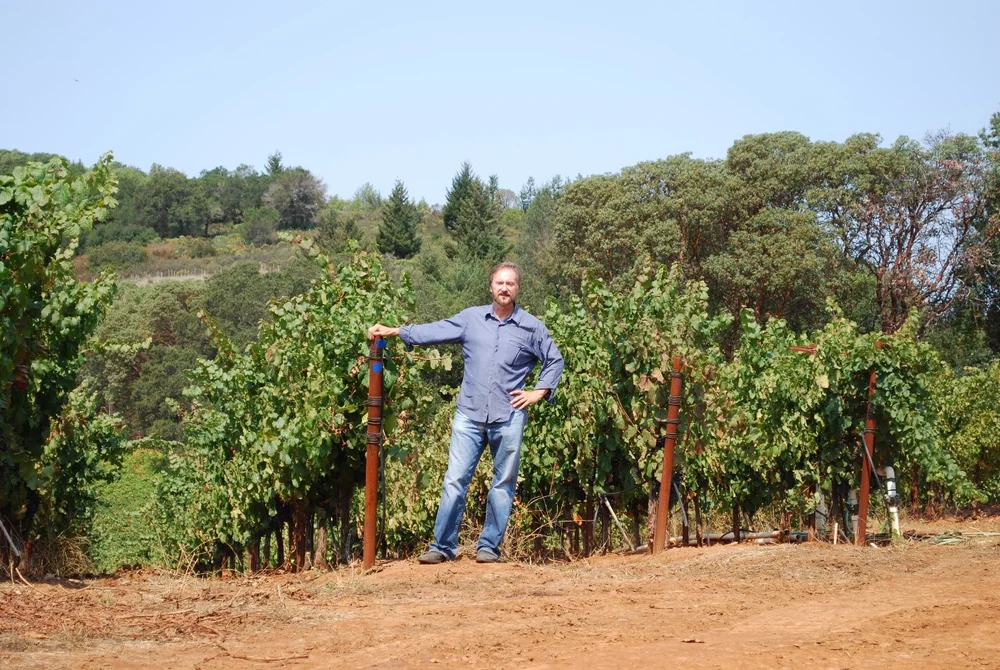 Knuttel sampling Malbec at Peterson Vineyard