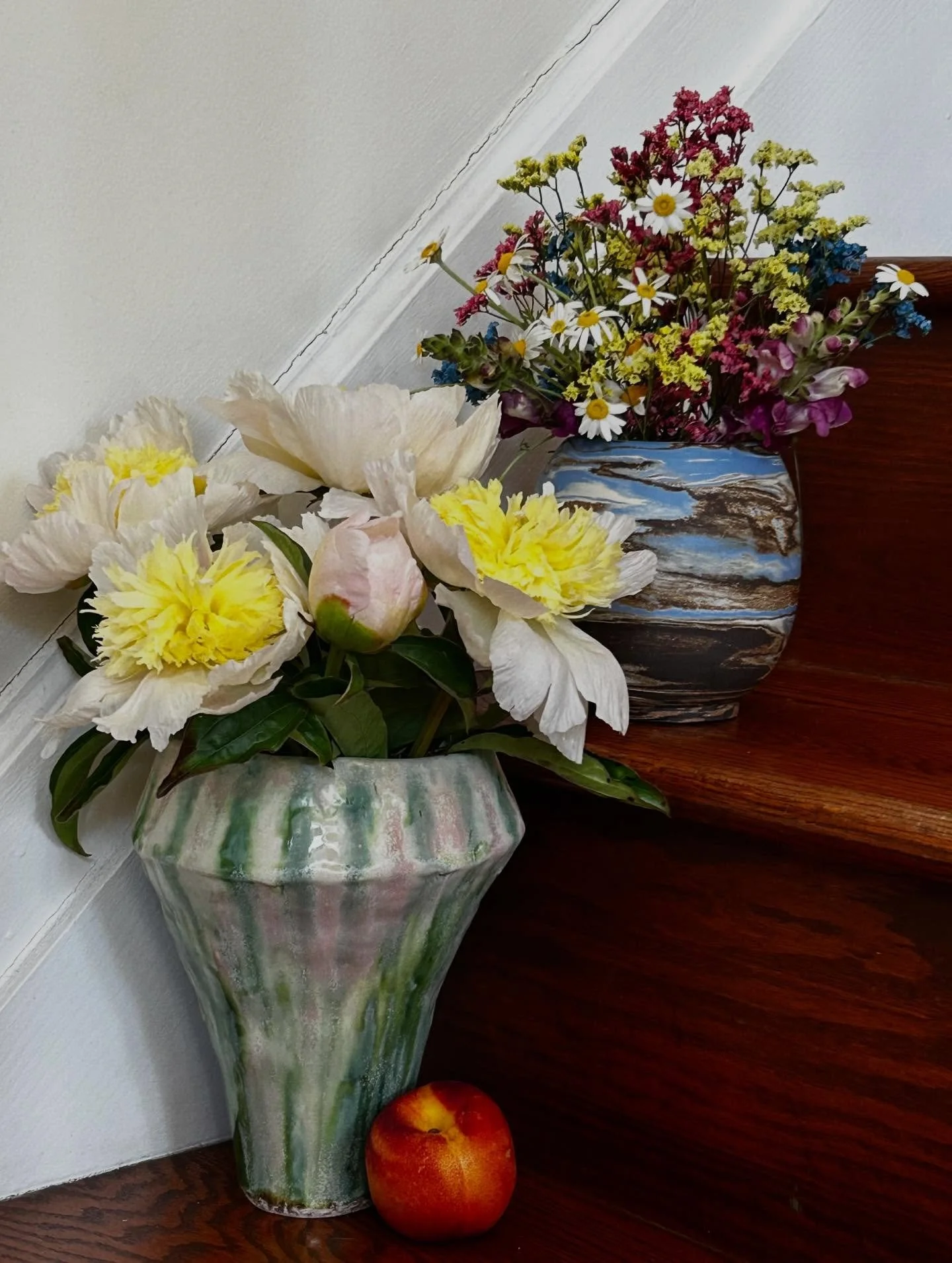 A story of two vases made by me, and some flowers. This includes the chapter about the oxide designs that melted away (twice, first time np) but left behind an Impressionist color palette &mdash; a happy ending! 

Swipe to the end for a reality check