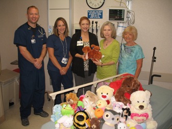 Cox Medical Center Branson Emergency Room staff Tim Costello, from left, Kristen Cardwell and Trauma Coordinator Angelina Hein accept a donation of stuffed animals from JATC members Treasurer Rita Parsons and Secretary Kathleen Brown.