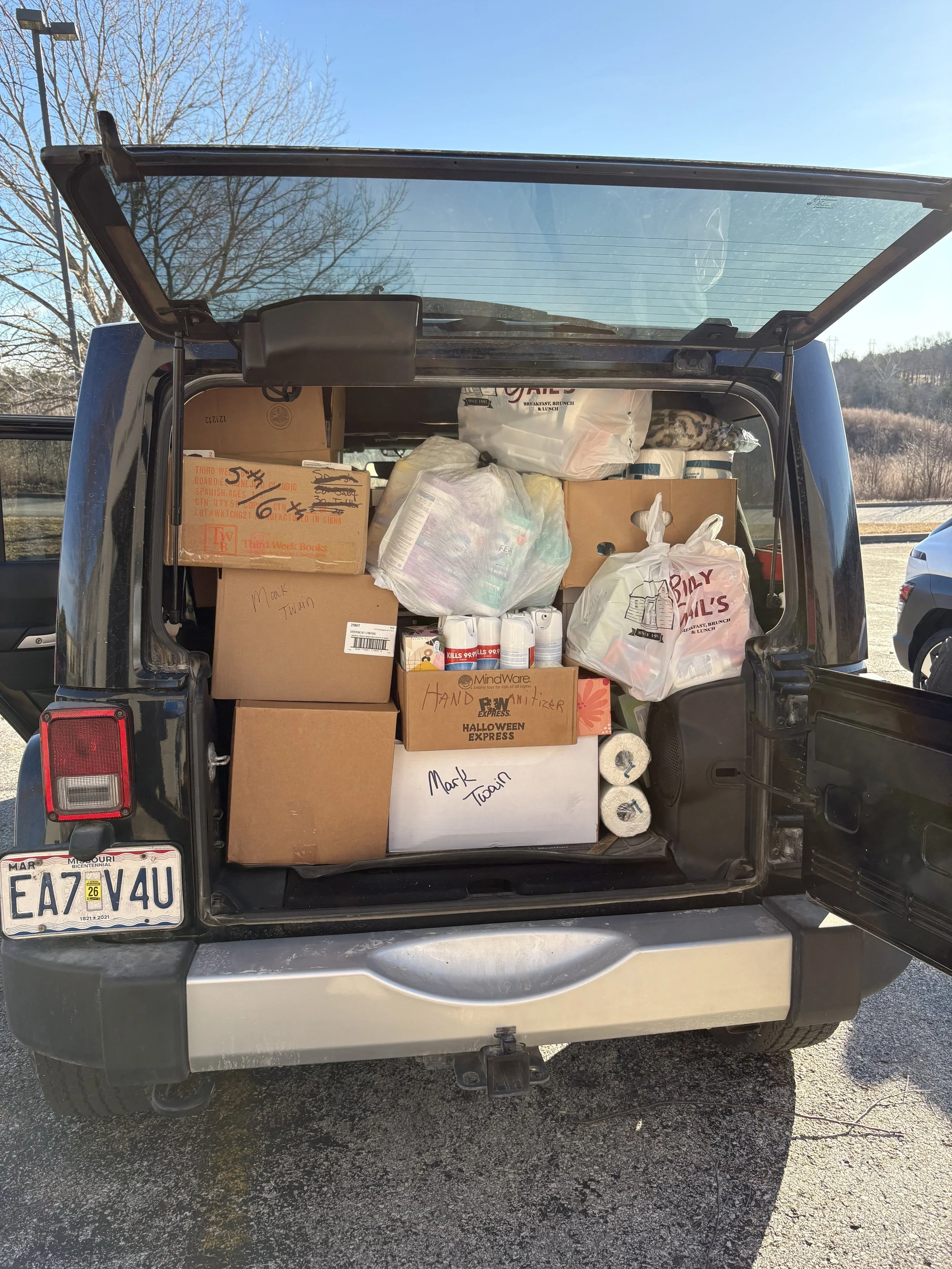 Delivering school supplies to Mark Twain and Bradleyville.jpeg