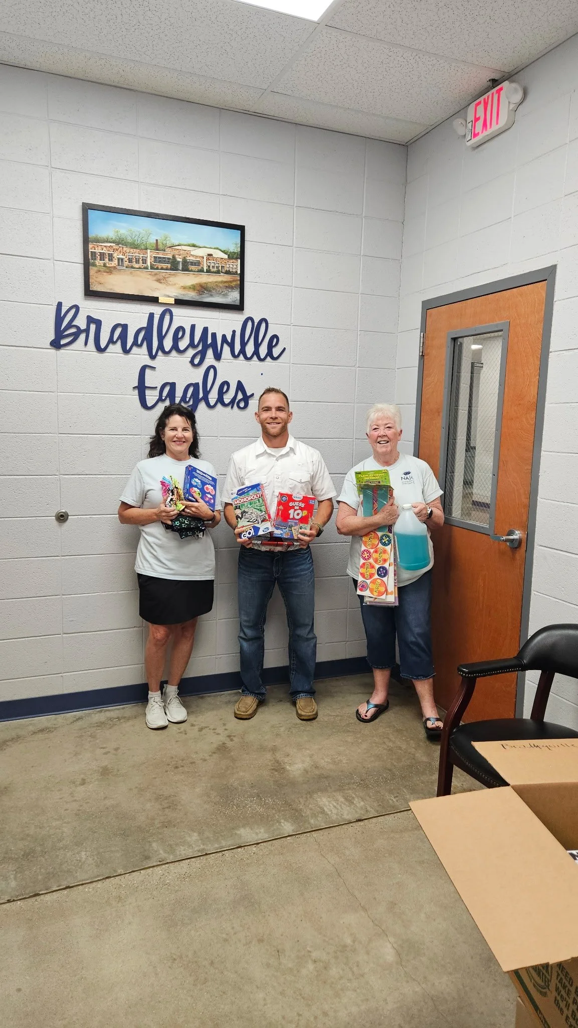 JATC Member Kelly Anstaett, Bradleyville Elementary Principal Ronnie Ray, and JATC Member Susan Thibeault-Linton.jpg