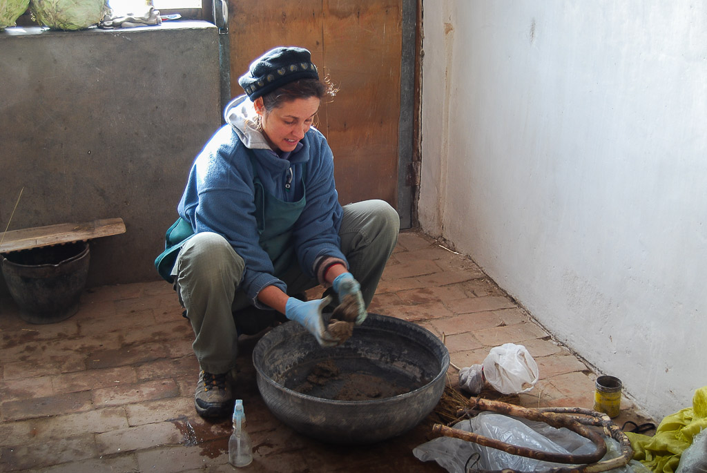 After a template is created, I mix the soil with cement, water, and cow hair to form a composite which can be molded into the rough shape of a hand.