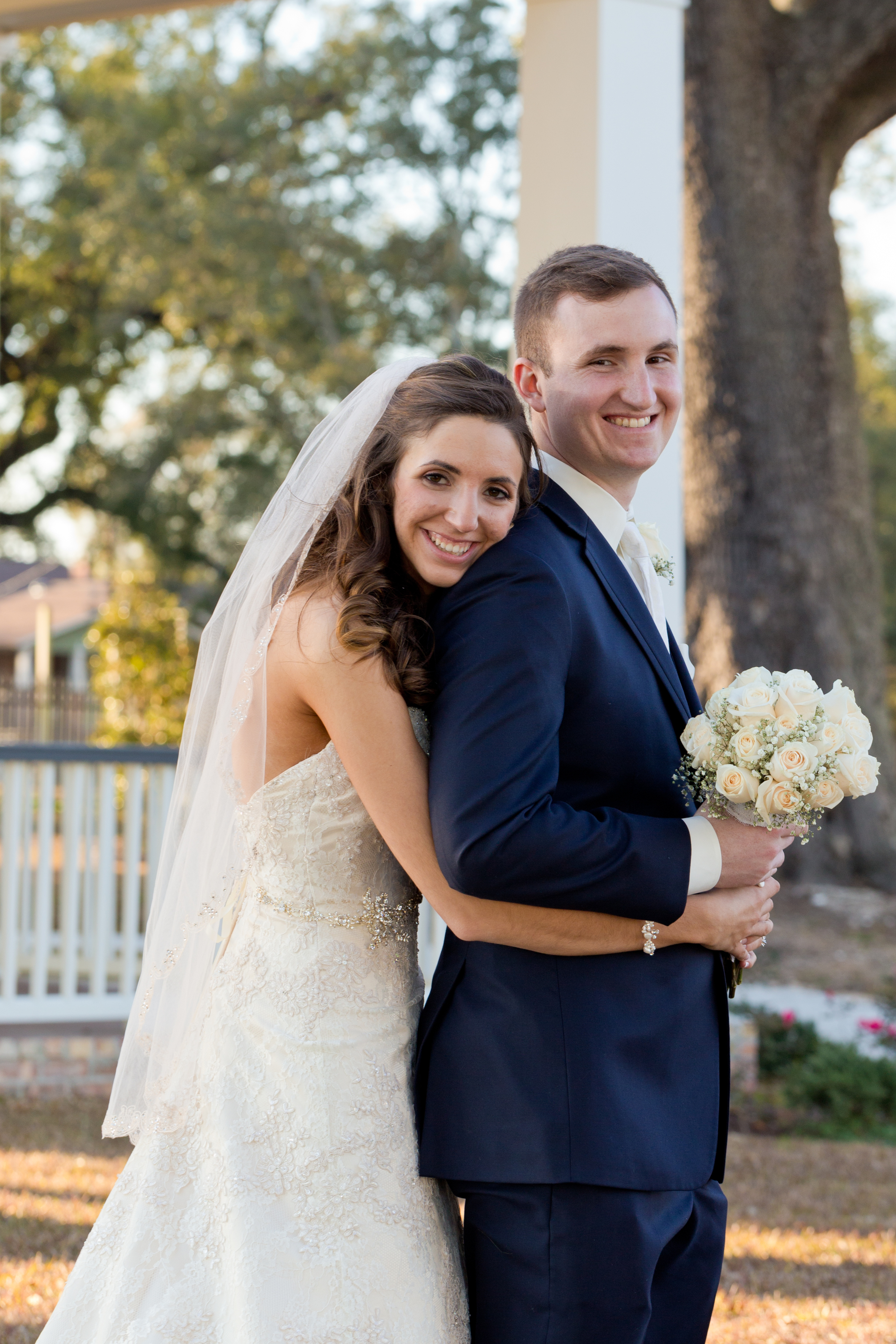 bride and groom at Lighthouse Park in Biloxi (Uninvented Colors Photography)