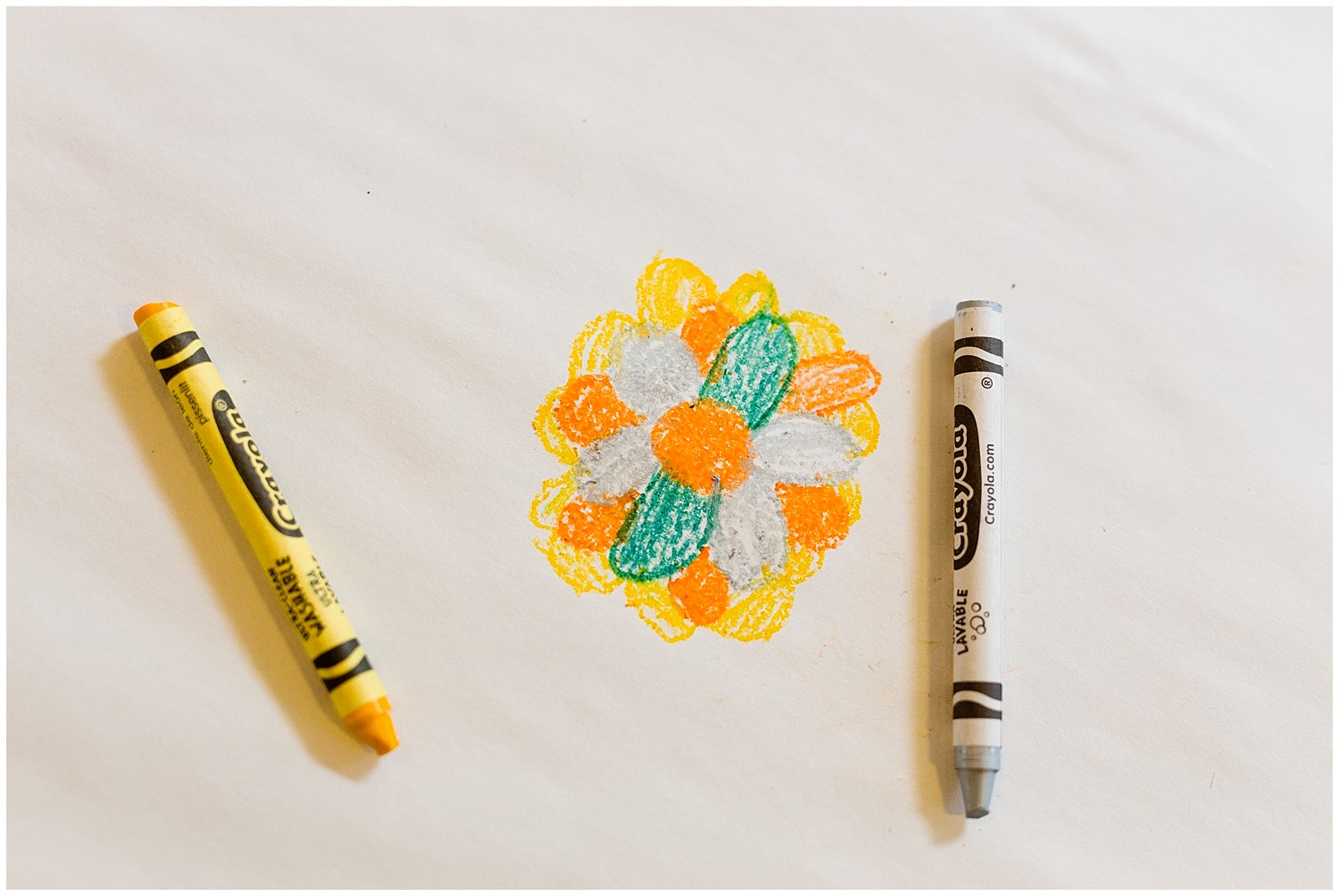 crayon drawings at kids table at wedding