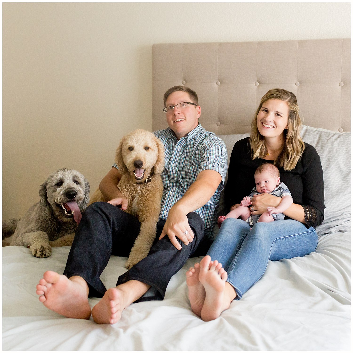 lifestyle family photo with newborn baby and two golden doodles - Biloxi, Mississippi photographer