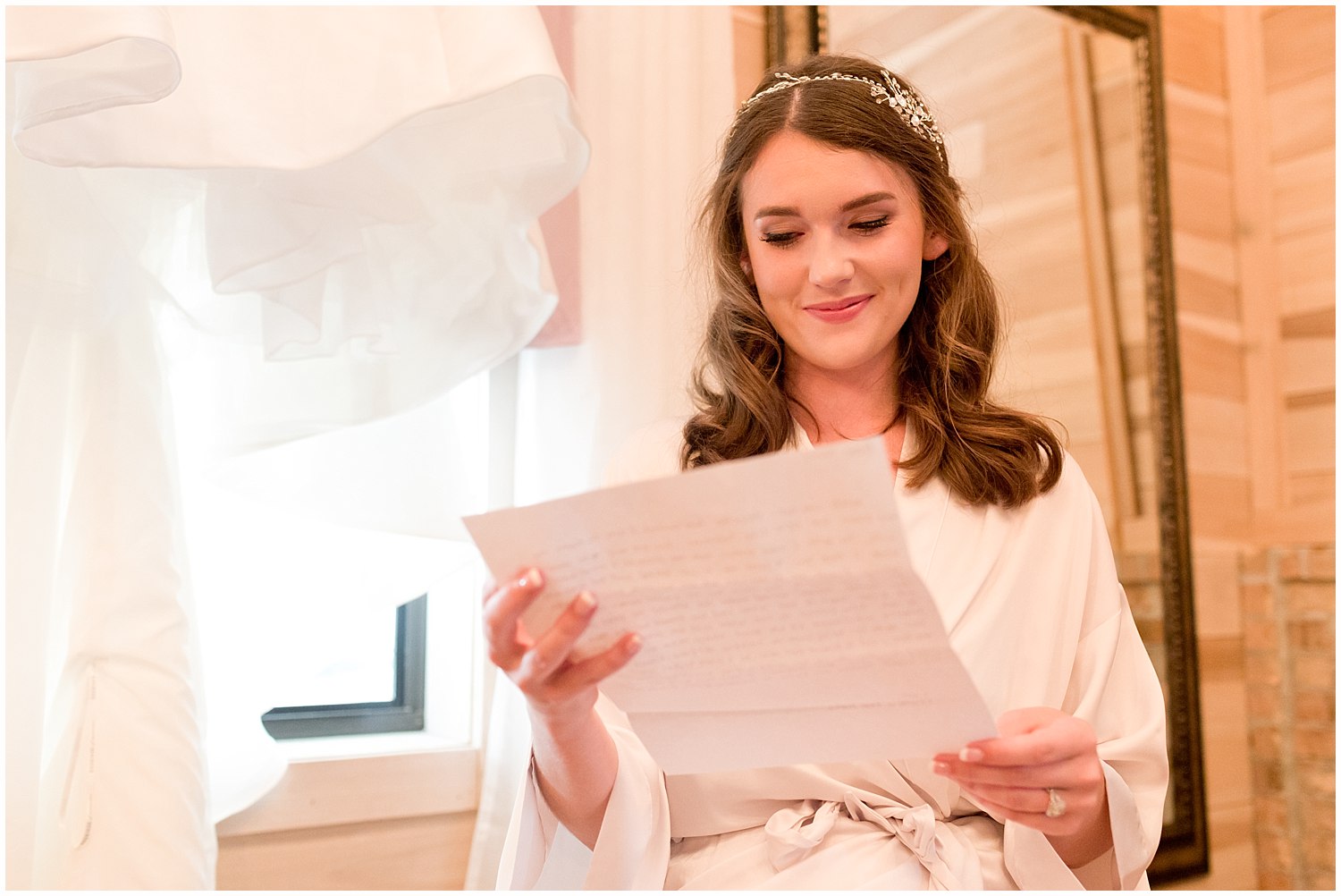 bride reading love letter from groom before wedding - Ocean Springs wedding photographer