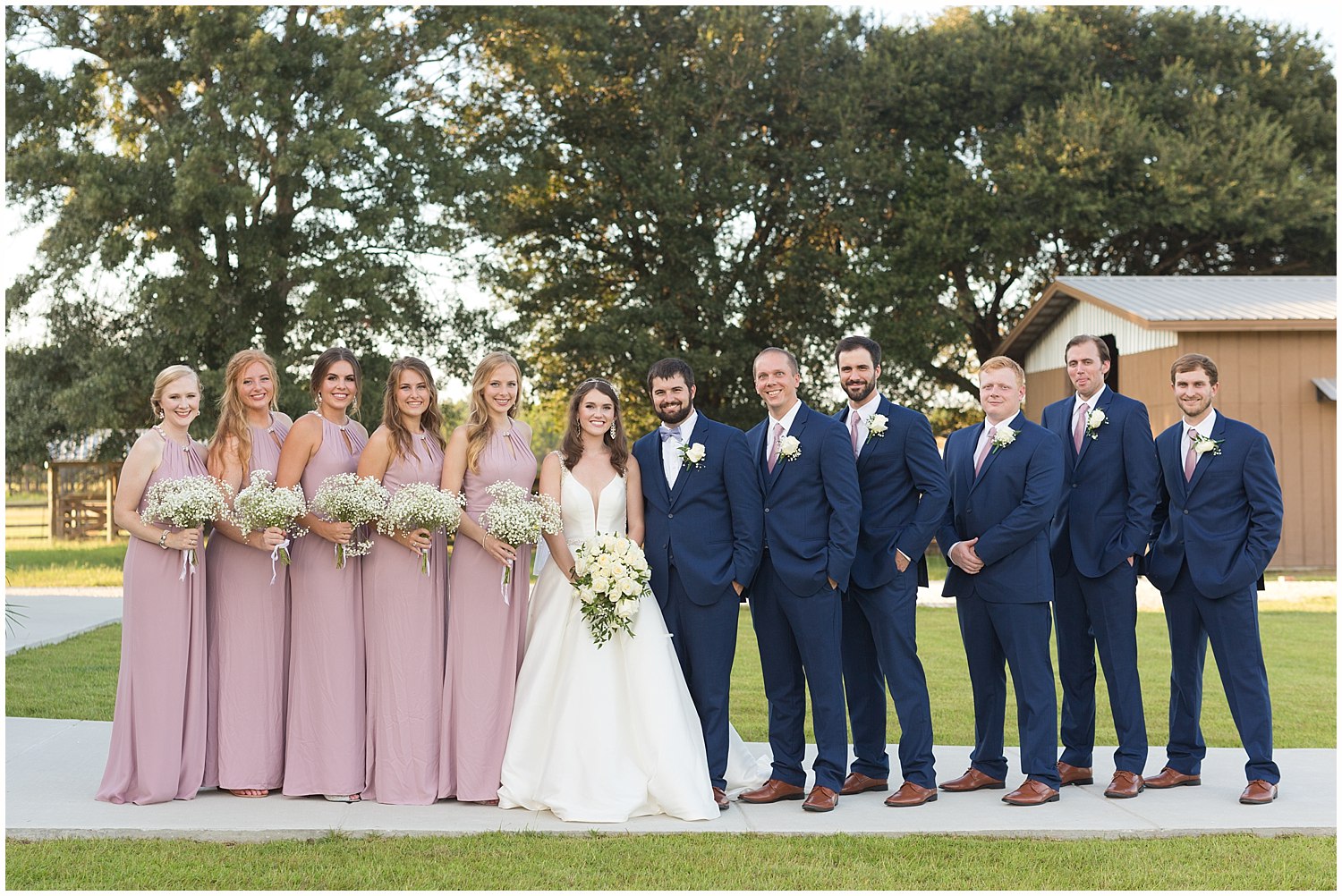 traditional wedding party portrait at The Barn at Love Farms