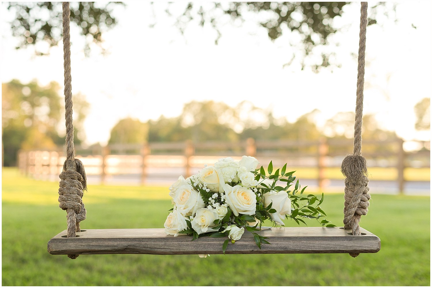 wedding bouquet on swing at barn venue