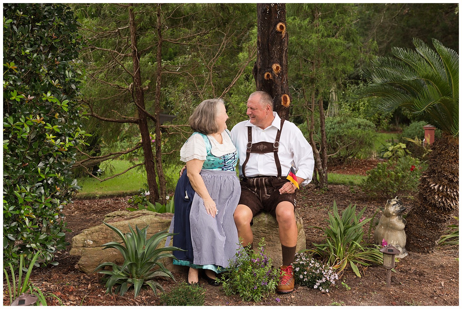 older couple portrait with authentic dirndl and lederhosen authentic German attire