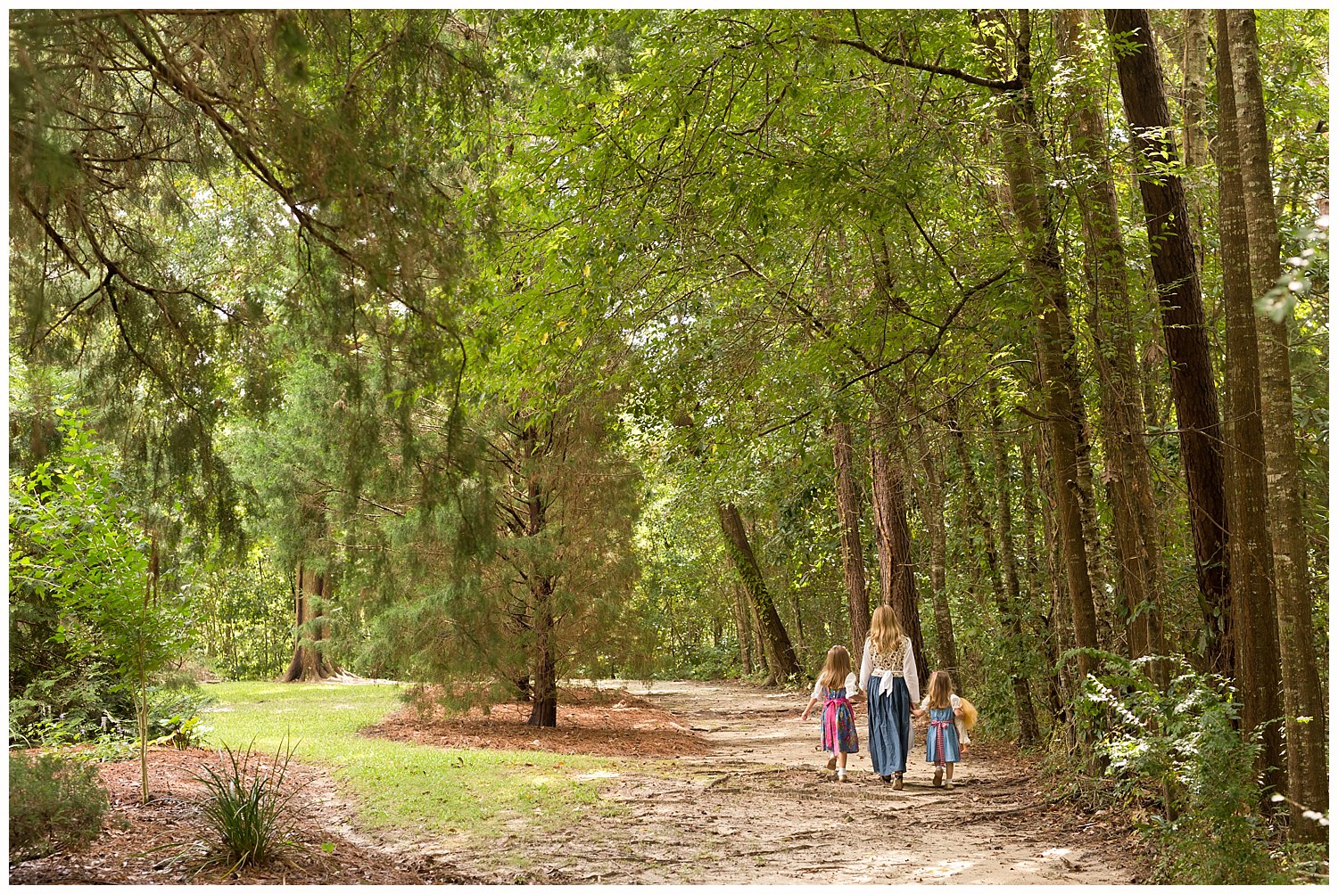 candid photo of girls in the woods in Ocean Springs, Mississippi