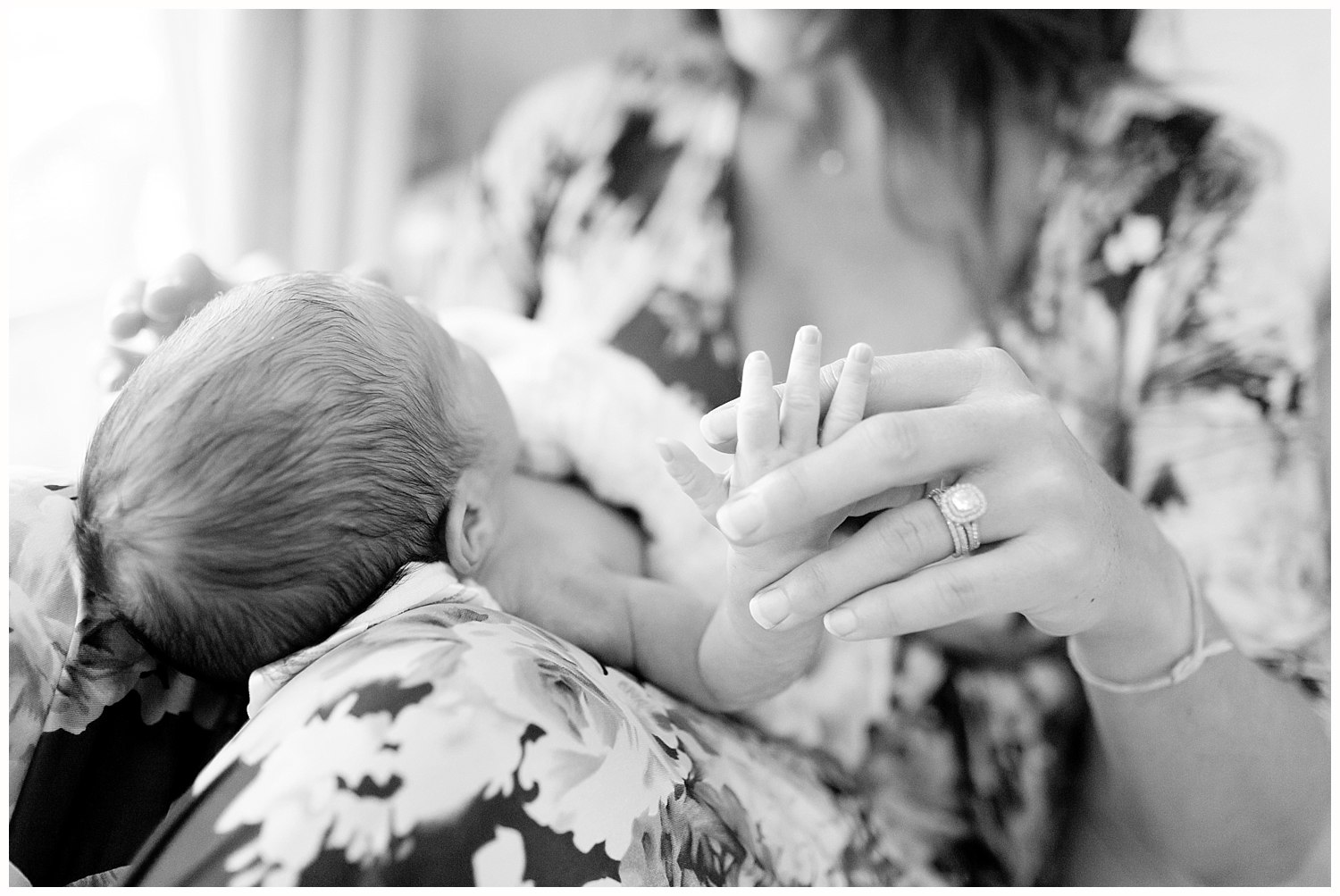 black and white picture of mom holding baby - Ocean Springs baby photographer