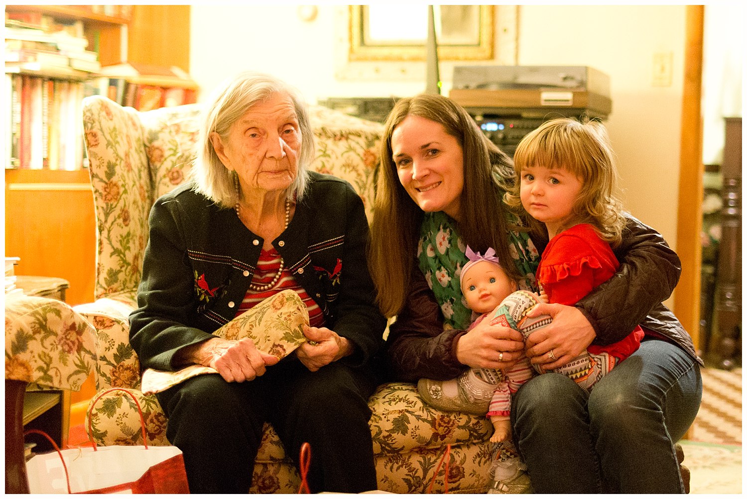 toddler girl with mom and elderly grandmother