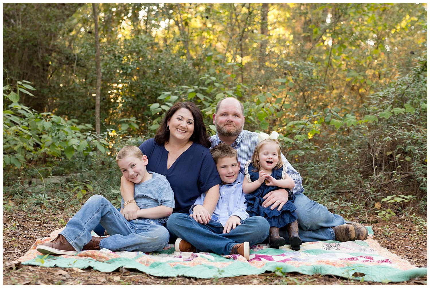Ocean Springs family photographer - woods, vintage quilt family pictures