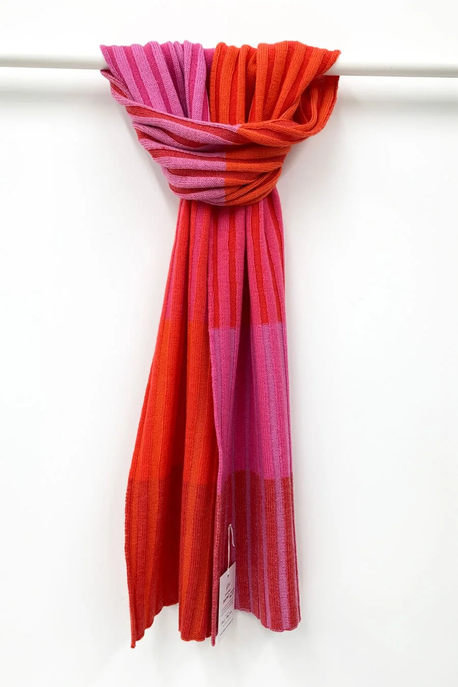 Striped merino scarf in reds and pinks.jpg