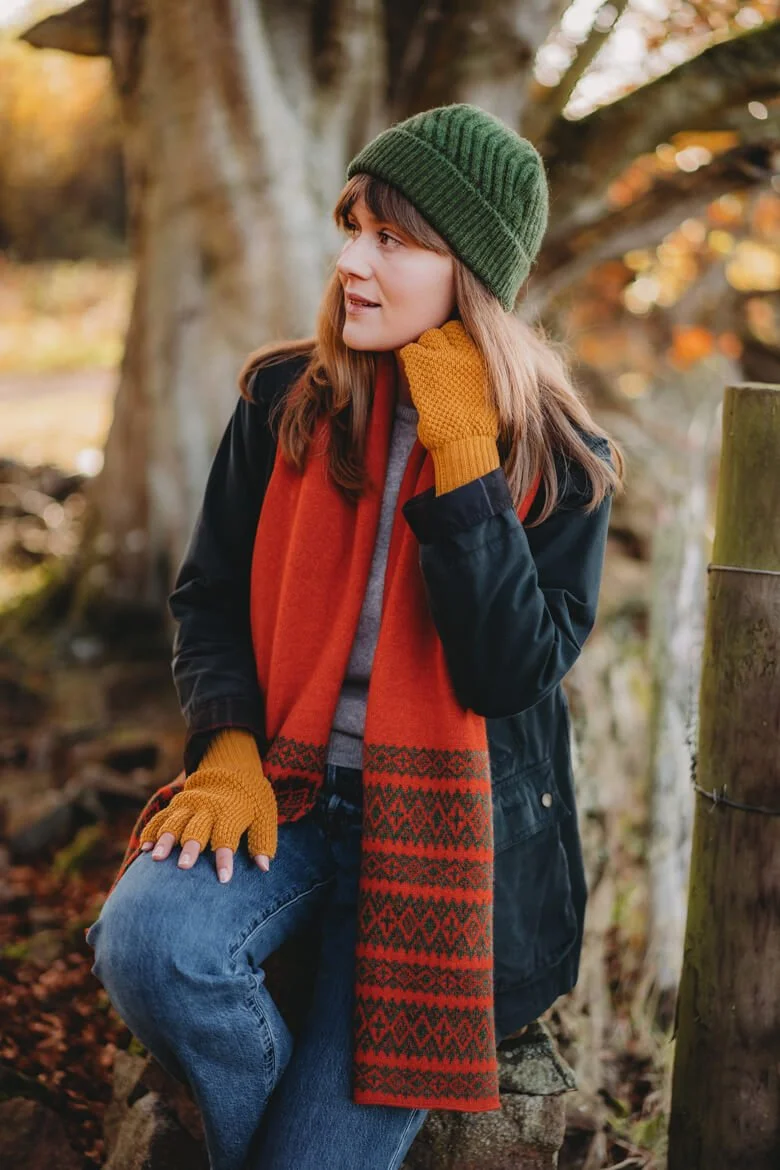 Orange fairisle lambswool scarf with yellow fingerless gloves and dark green beanie hat by Collingwood-Norris.jpg