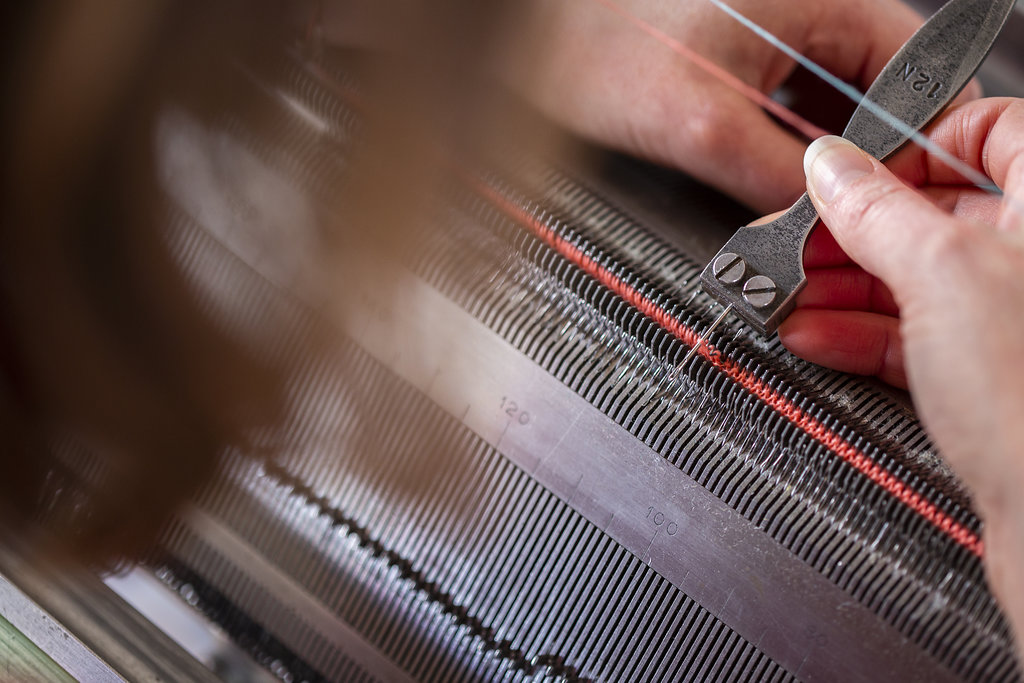 Transferring stitches requires precision.