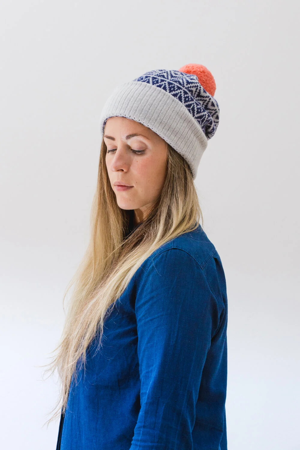 Teviot Pom Hat. A thick lambswool bobble hat made in Scotland. Luxury Scottish Knitwear by Collingwood-Norris