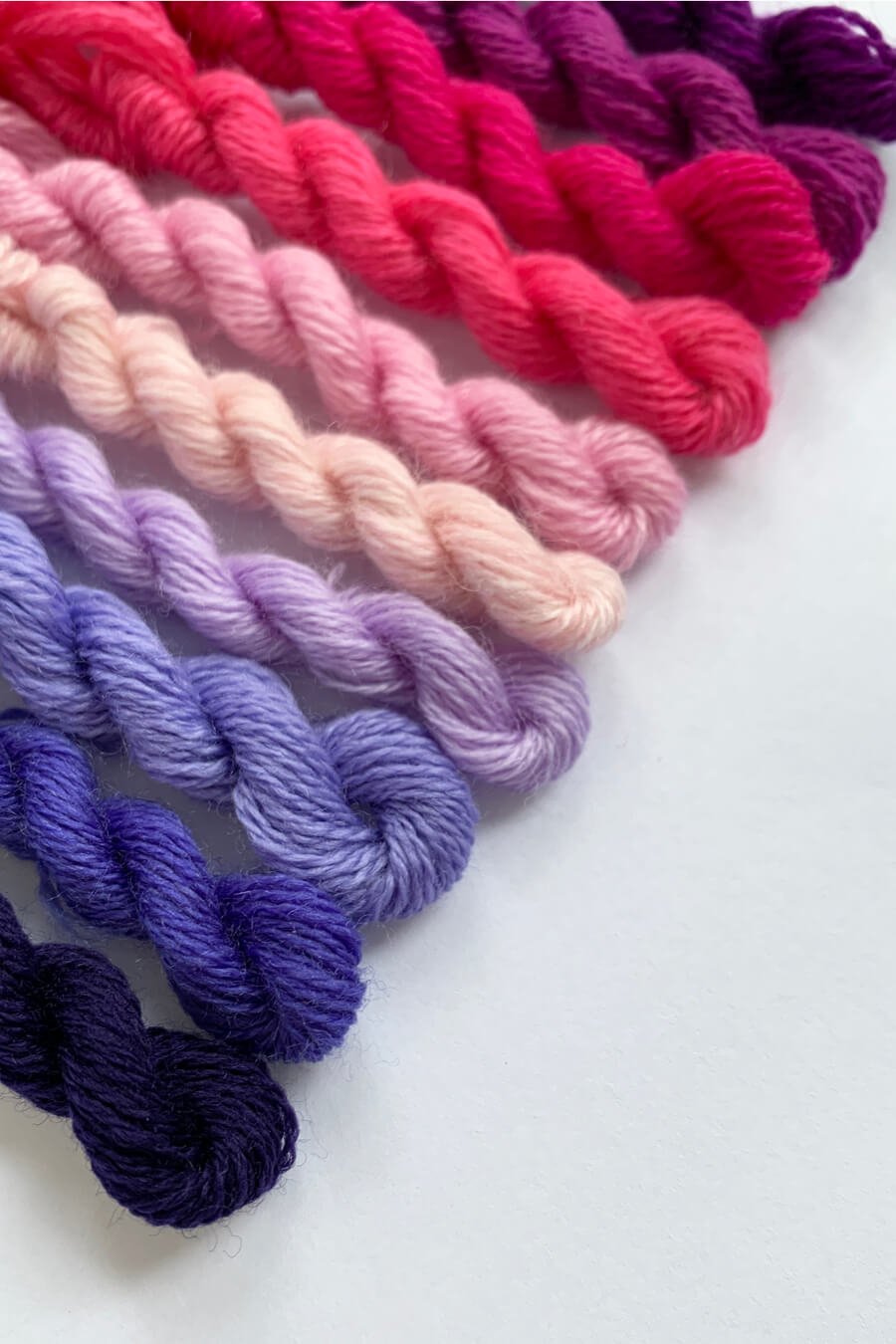 fine merino wool for darning in pinks and purples