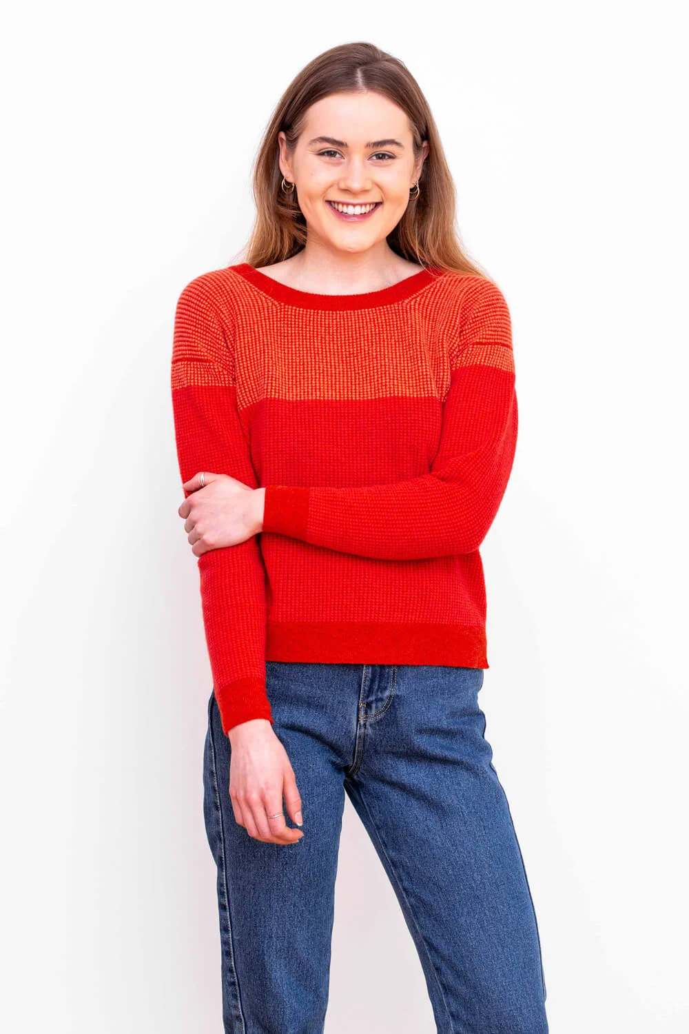 Womens Designer lambswool sweater in reds. Made in Scotland by Collingwood-Norris. Luxury Scottish Knitwear