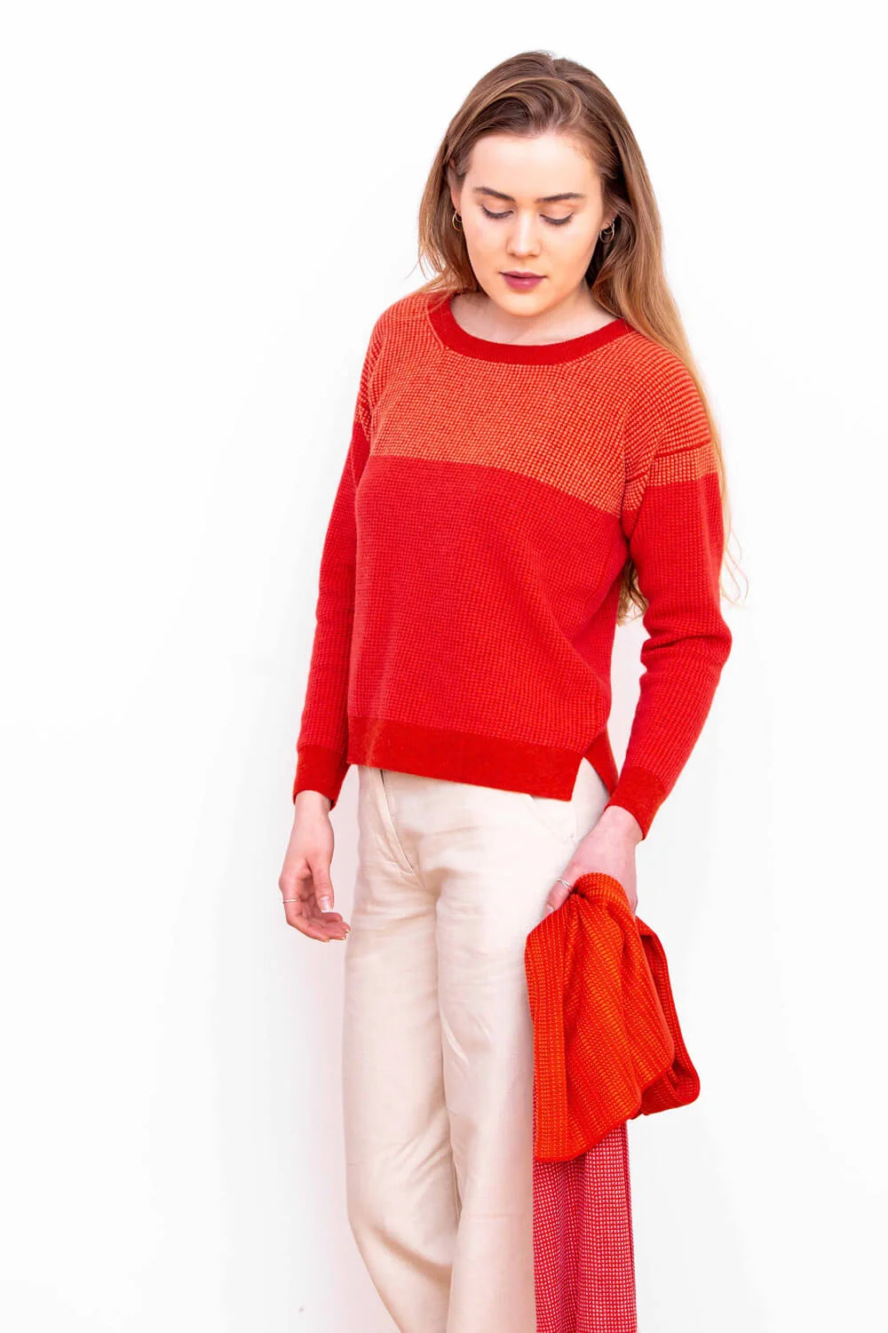 Womens Designer lambswool sweater in reds. Made in Scotland by Collingwood-Norris. Luxury Scottish Knitwear