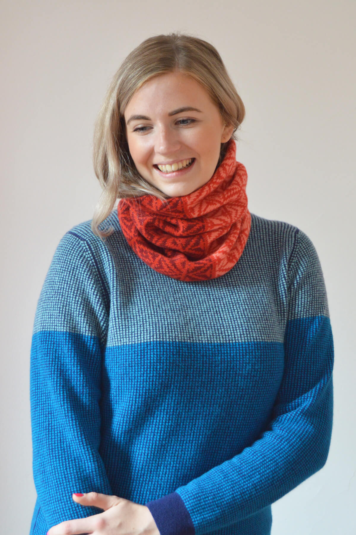 Red and pink lambswool cowl by Collingwood-Norris. Luxury knitwear handmade in Scotland