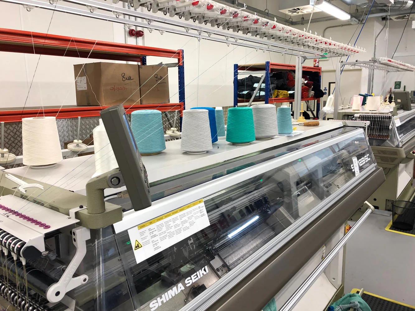 This is the machine the panels of the sweater are knitted on.