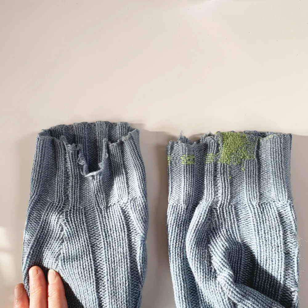 Both cuffs, with one mend already started.