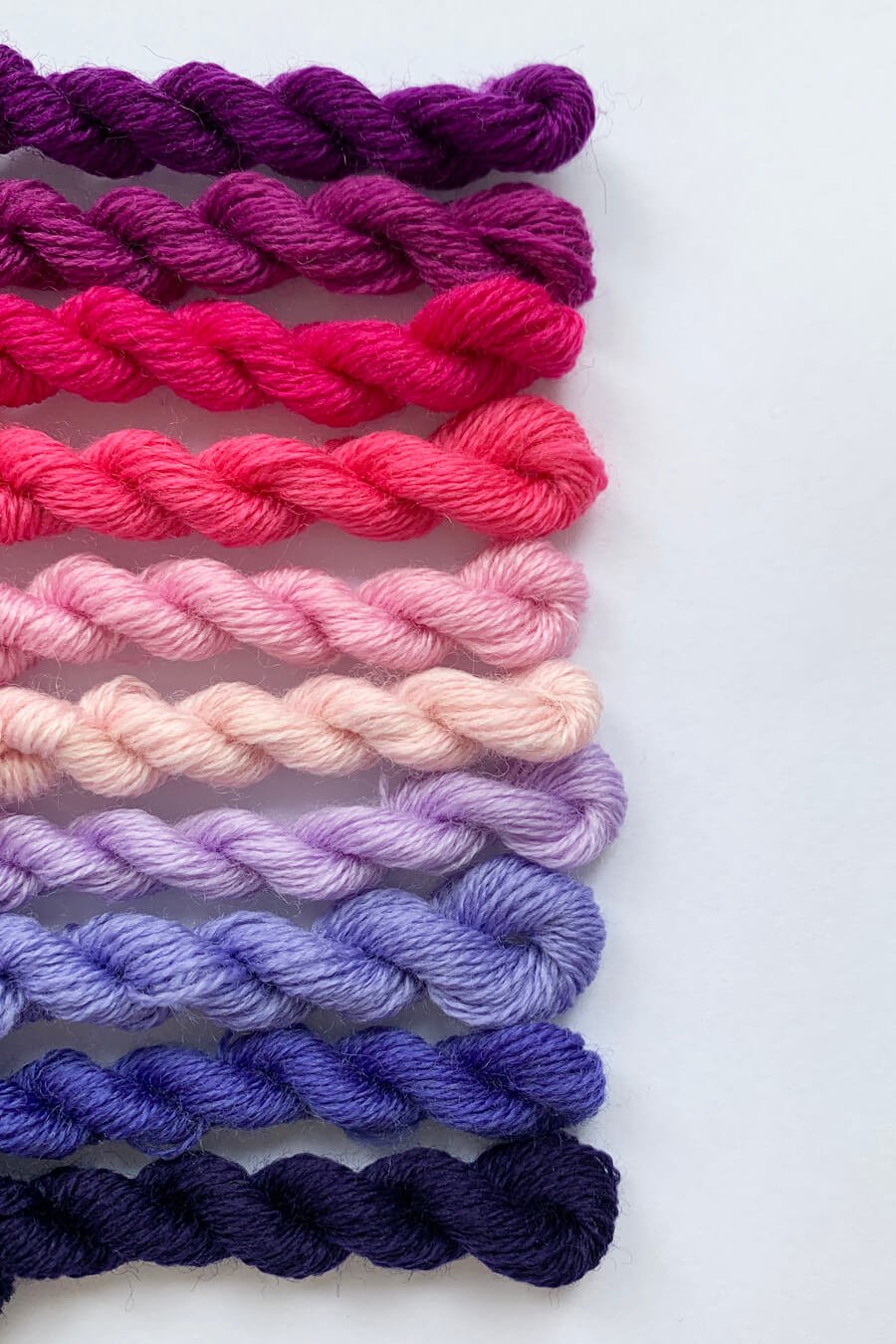 fine merino wool for darning in pinks and purples