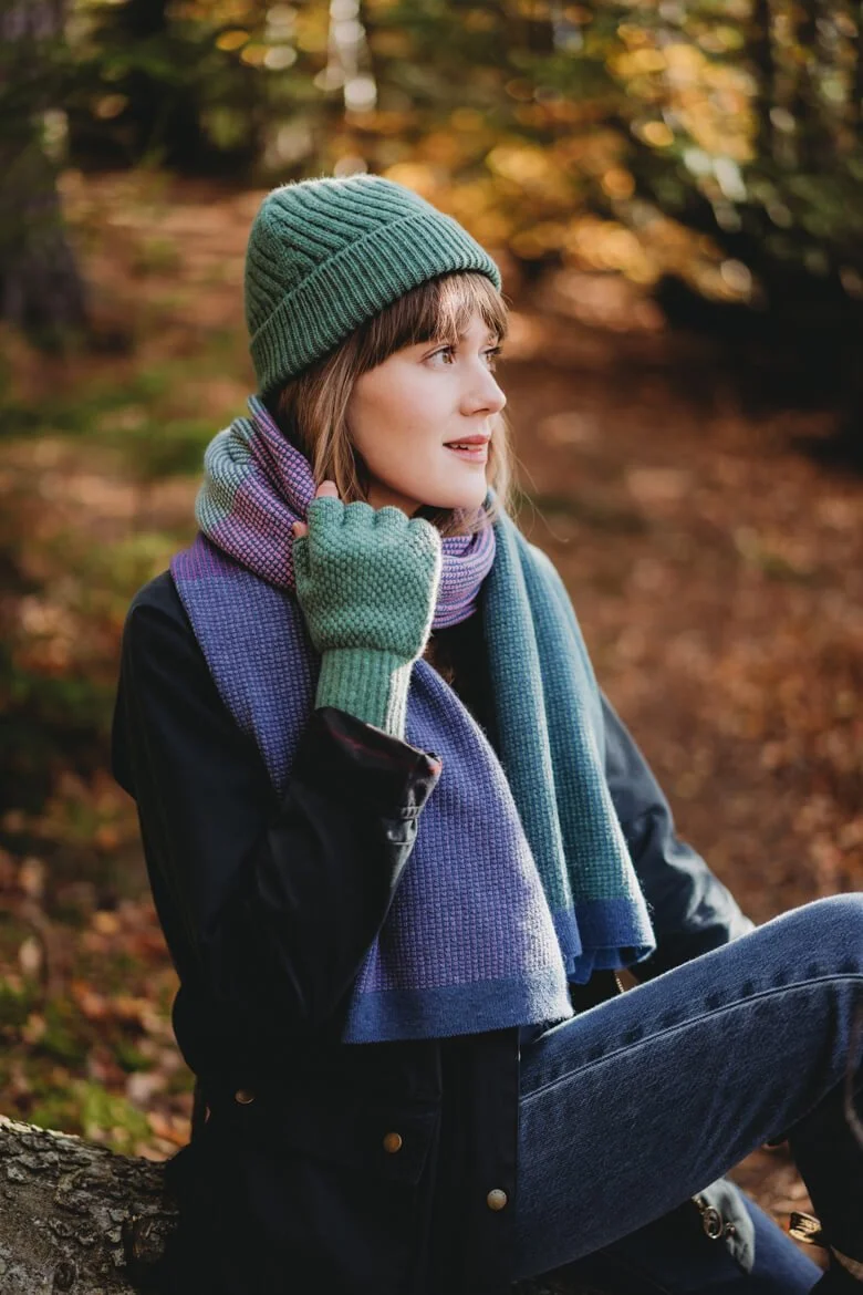 Green and purple lambswool scarf with soft green hat and fingerless gloves ethically made by Collingwood-Norris.jpg