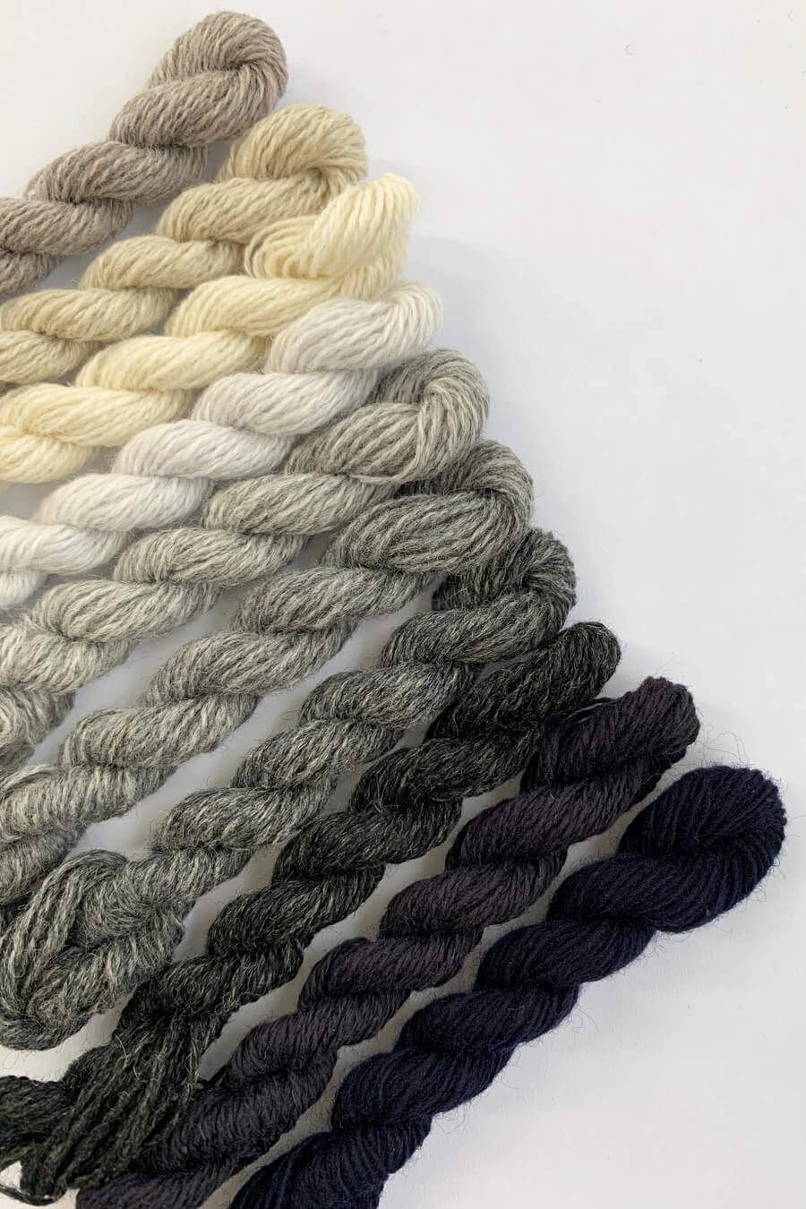 Neutral cashmere yarn for darning.jpg