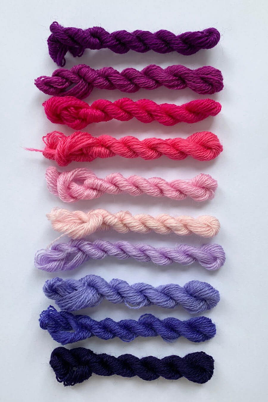 fine merino wool for darning in pinks and purples