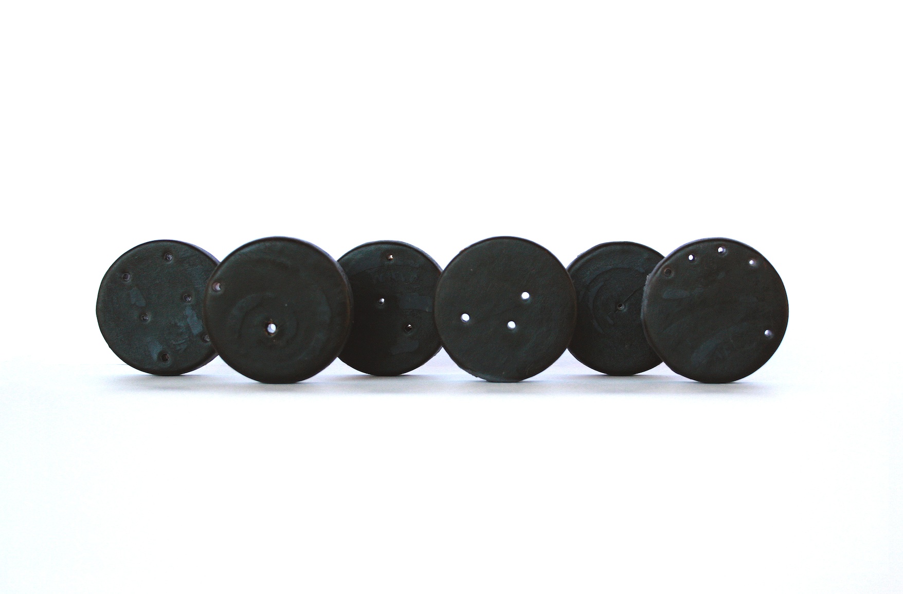  Christine Kettaneh,  Soap Coins , post-side2, laser-engraving on soap, 2014. 