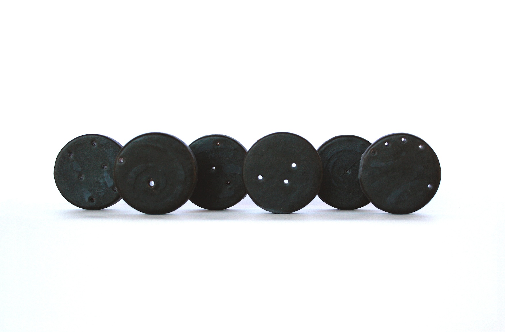 Christine Kettaneh, Soap Coins , post-side2, laser-engraving on soap, 2014.