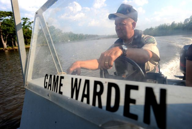 Game Warden Mike Boone patrolling the Neches for Water Safety Violations.jpg