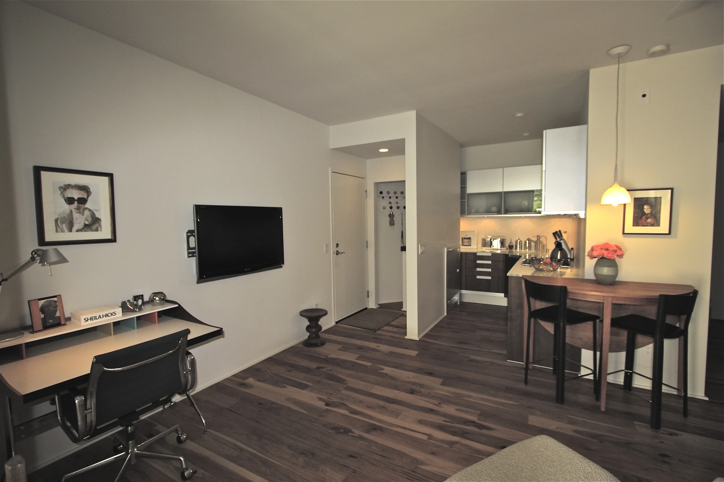 Looking towards kitchen and entry.