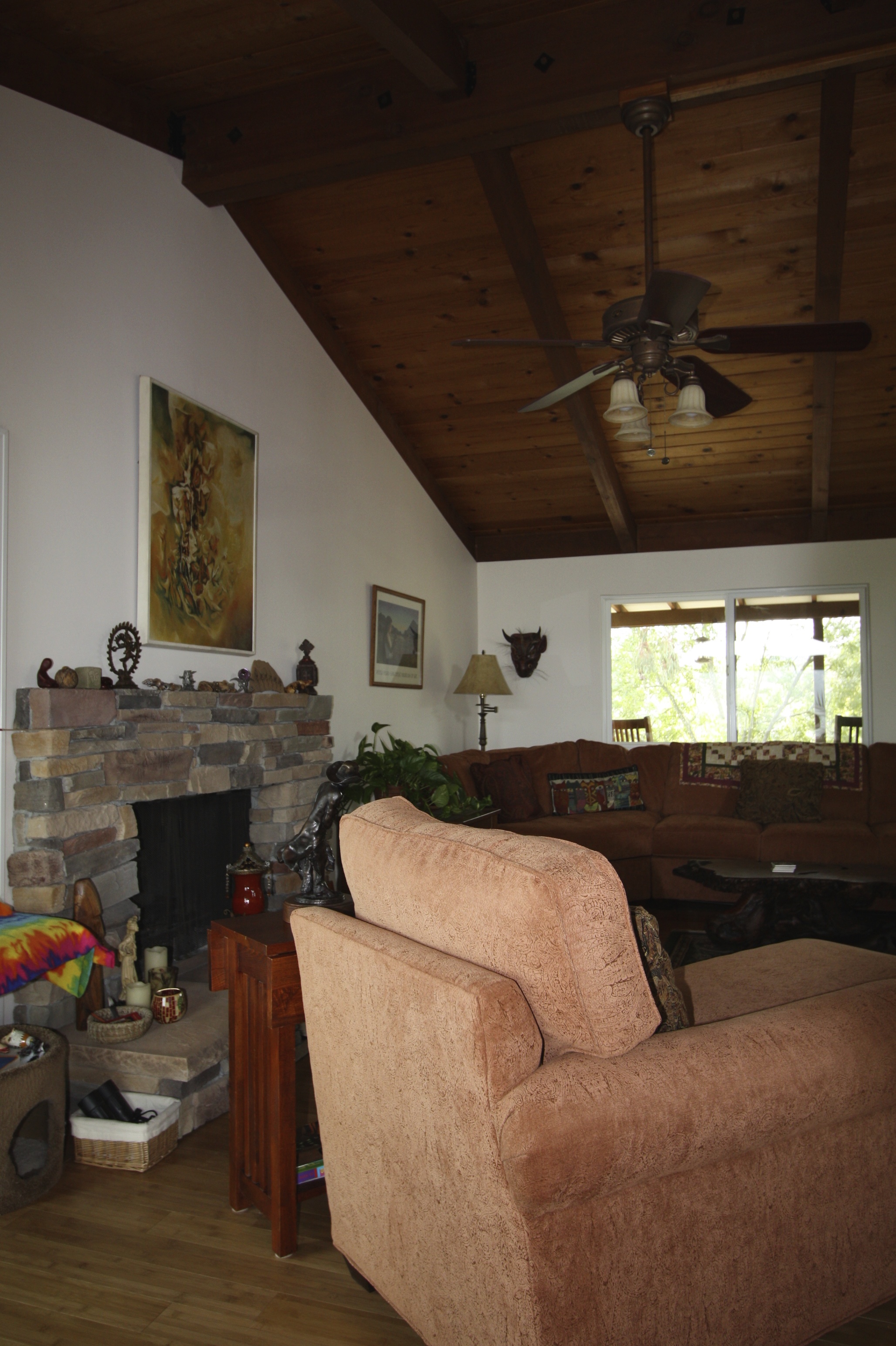  After: Light colored walls, bamboo floors,&nbsp;new fireplace surround. 