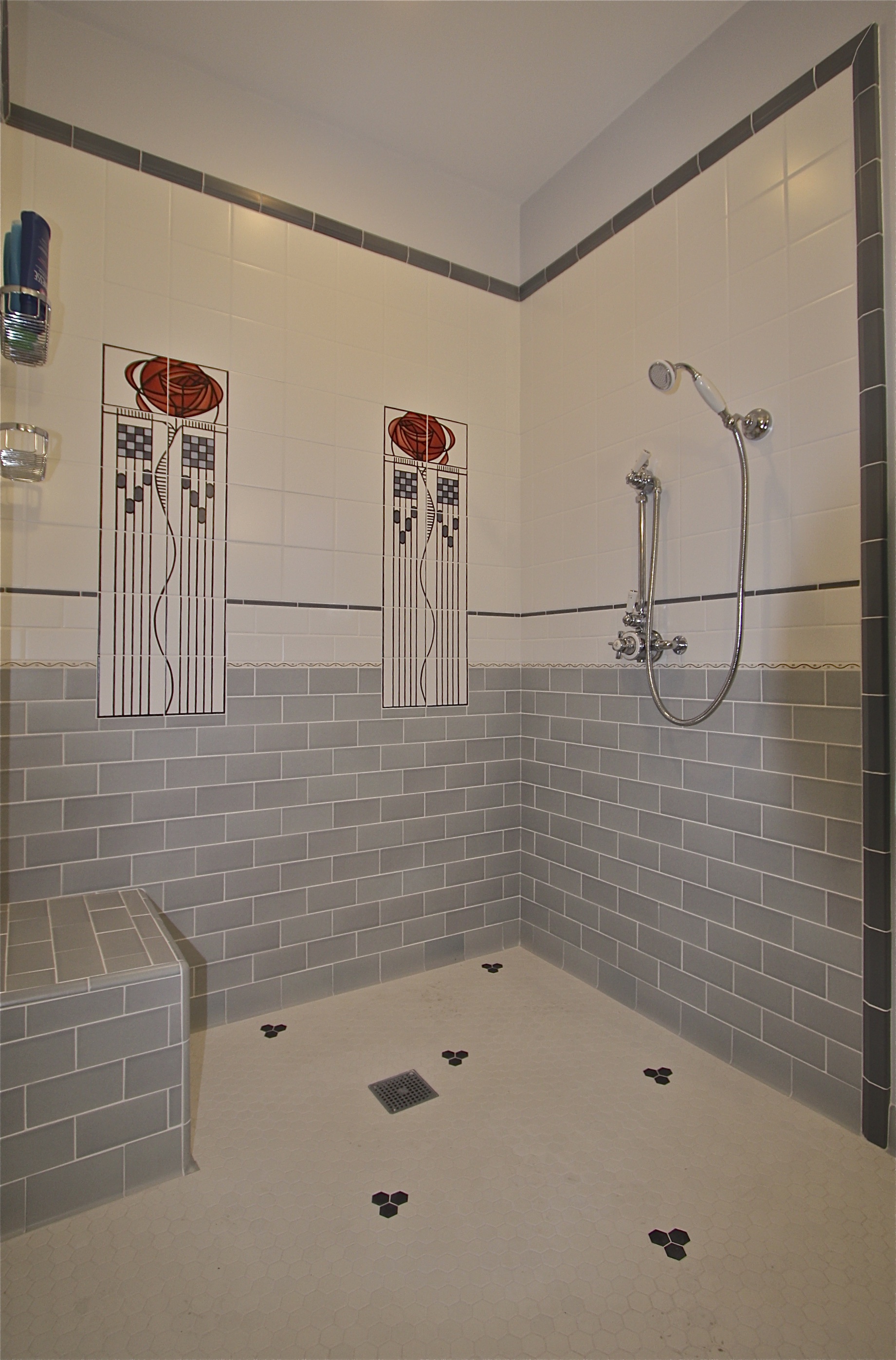  After: New damless shower incorporating 12 sq. ft. of area&nbsp;from adjoining half bath. 