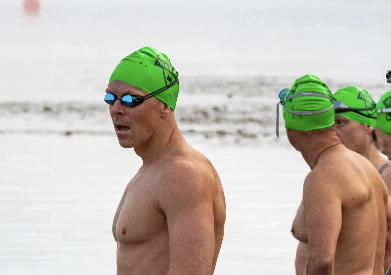 Light and dark mirrored swim goggles designed for pool training and open water swimming