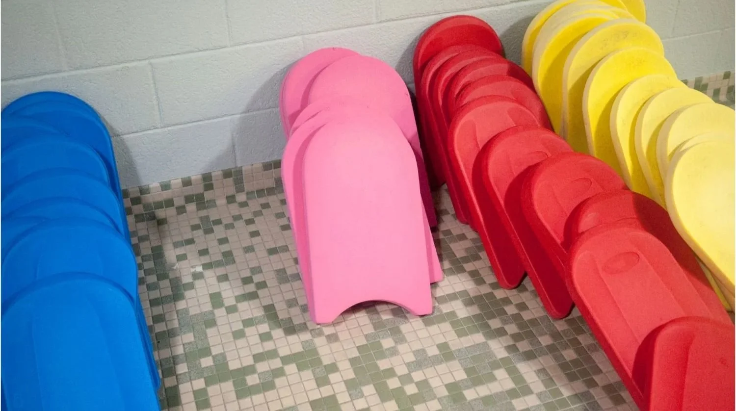 Classic swimming kickboard in the pool