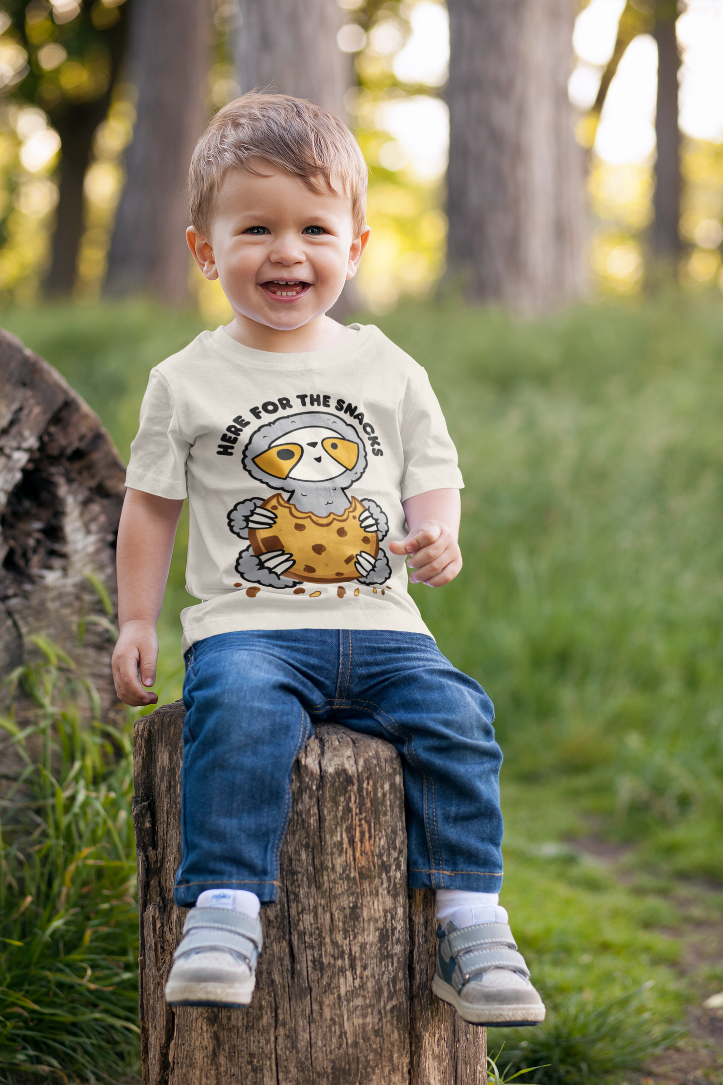 t-shirt-mockup-of-a-toddler-sitting-on-a-log-2911-el1.png