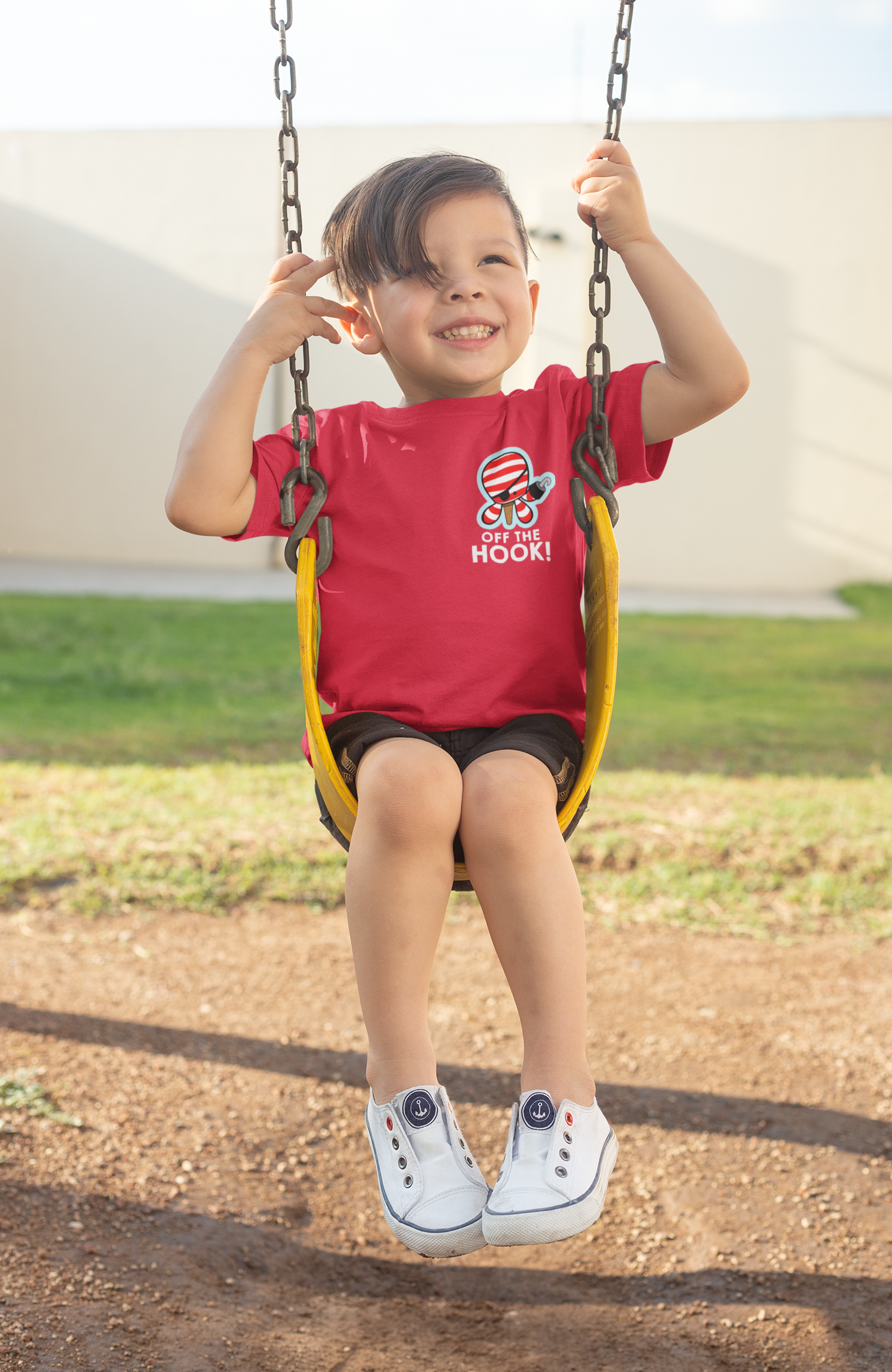 t-shirt-mockup-of-a-boy-playing-on-a-swing-28082.png