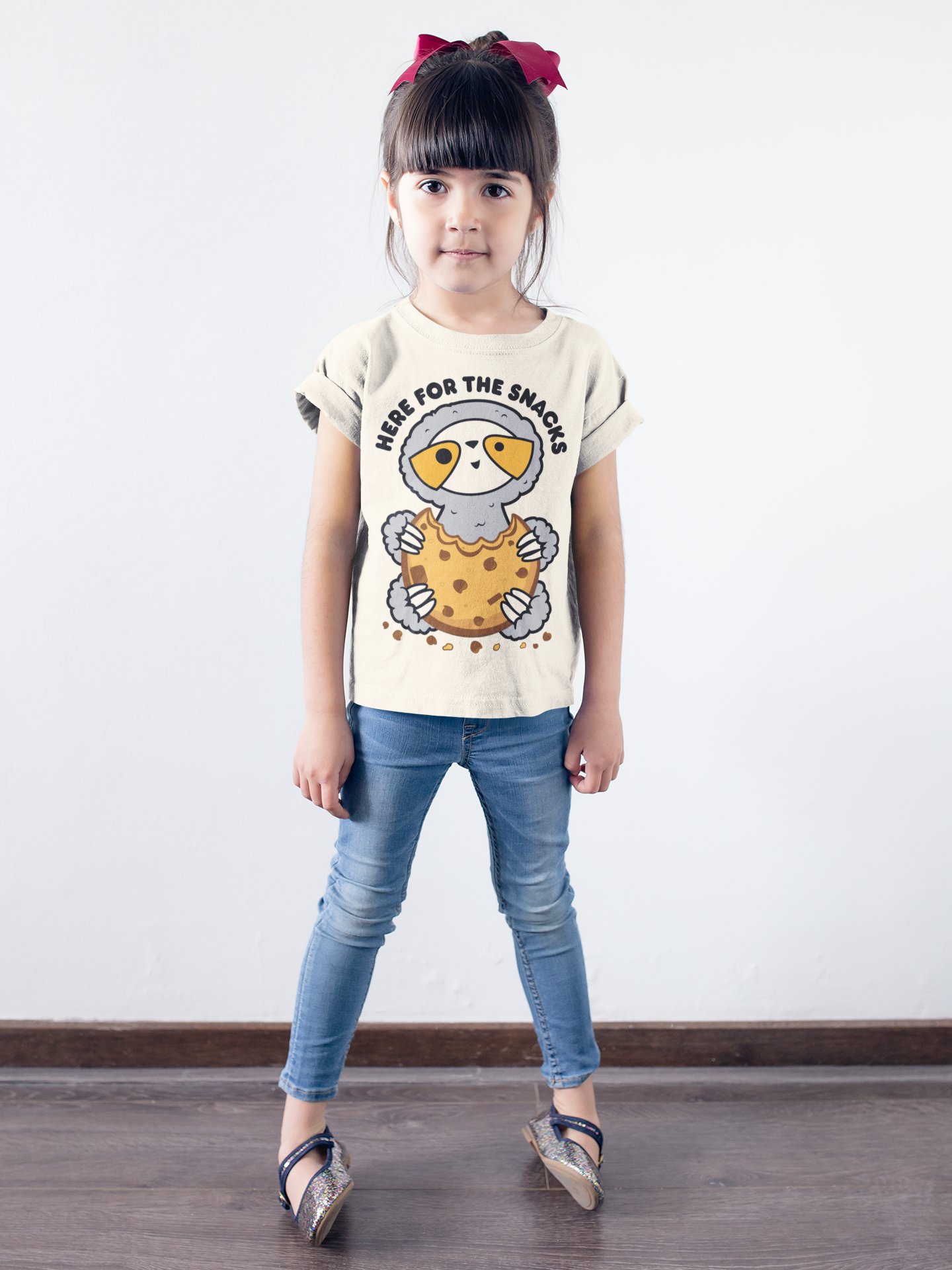 little-girl-wearing-a-t-shirt-mockup-against-a-white-wall-a19465.png