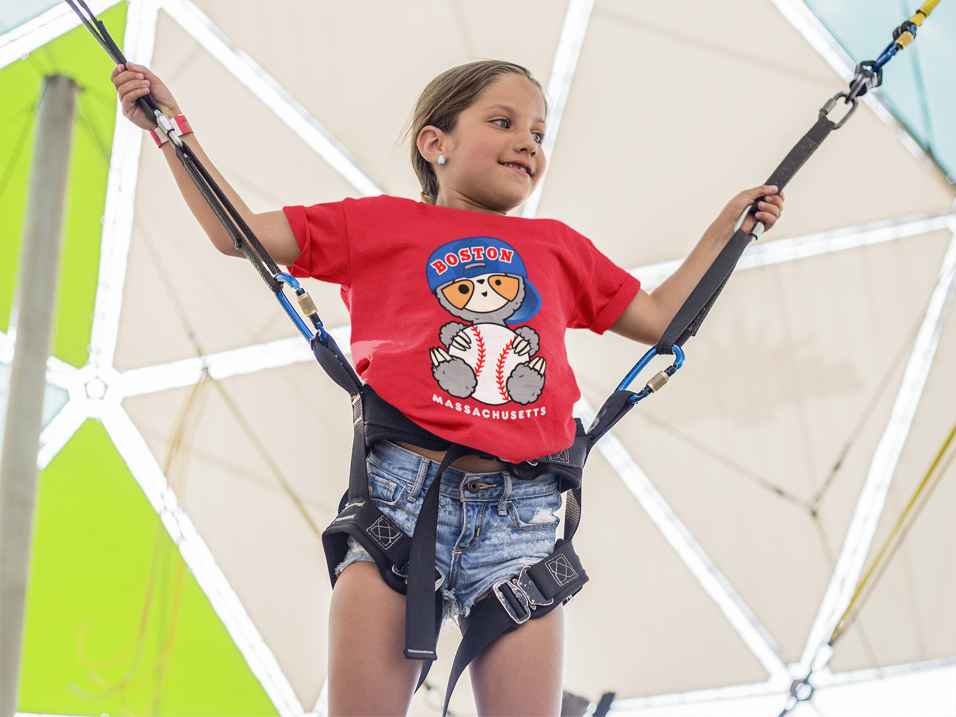 mockup-of-a-white-kid-wearing-a-t-shirt-while-about-to-jump-in-an-amusement-park-a16167 (1).png