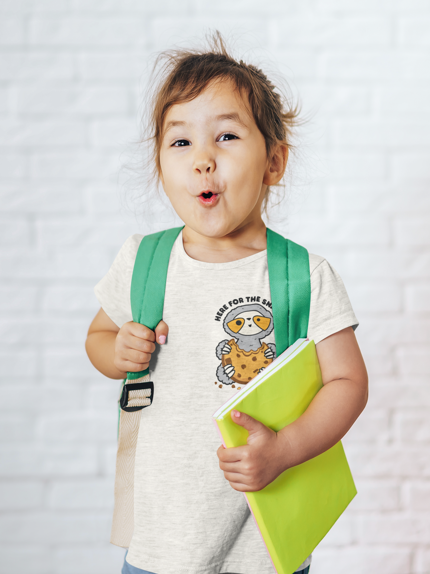 t-shirt-mockup-of-a-little-girl-making-a-funny-face-as-she-s-ready-for-school-m24849-r-el2.png
