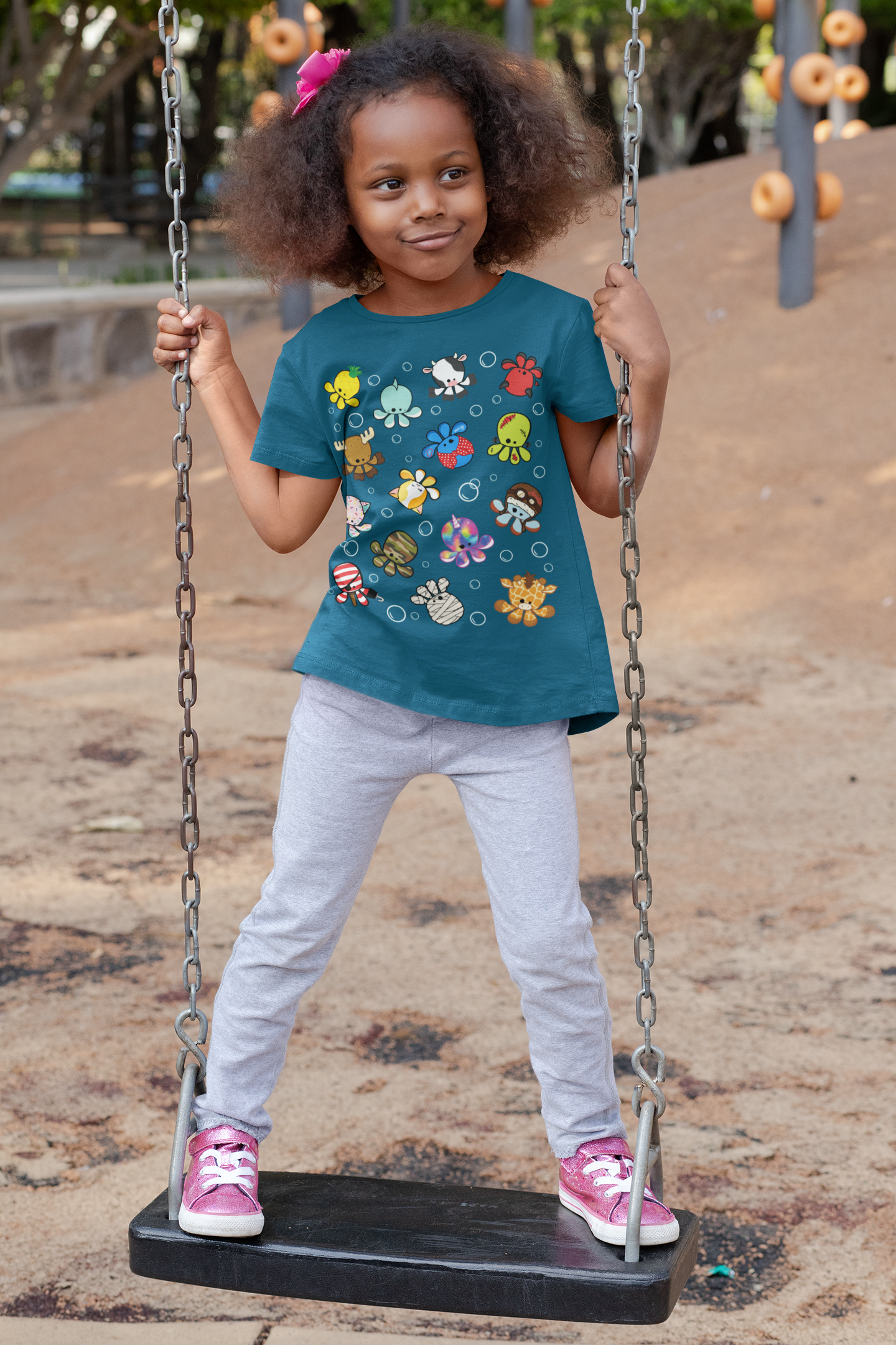 t-shirt-mockup-of-a-playful-girl-standing-on-a-swing-32179 (1).png